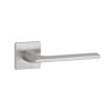 Tev Handles' Salvia handle in brushed chrome provides a luxurious, minimalist look with a slim square rosette for stylish indoor spaces.