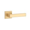 Tev Handles' Sulla handle in matt gold combines modern luxury with a premium finish, featuring a stylish square rosette for interior doors.