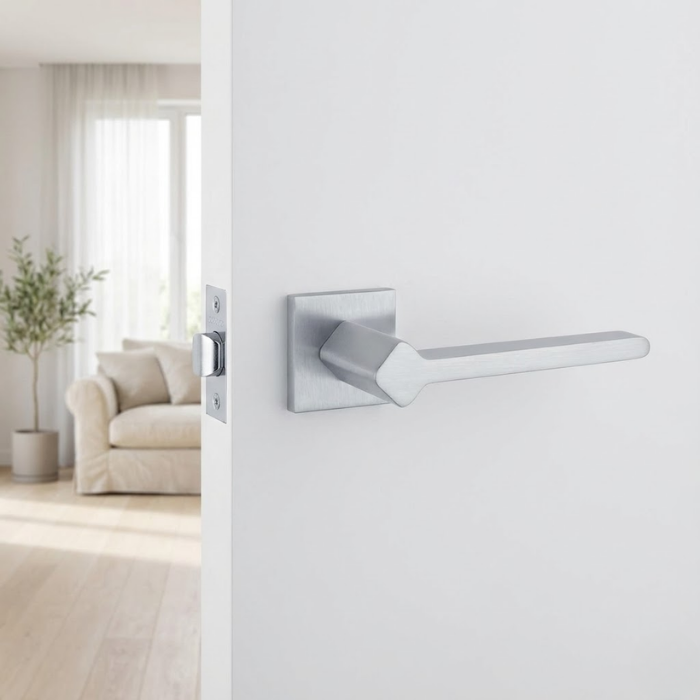 Ninfea - Q - Satin Chrome Ninfea on Square Rosette sophisticated square door handles featuring a sleek satin chrome finish on a clean, minimalist white interior door.