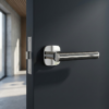 Davidia on Square Rounded Rosette refined internal door handles in polished chrome with a black leather handle on a contemporary dark grey door.