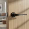 Azalia on Round Rosette in matt black, a high-quality internal door handle with a refined contemporary design.