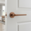 Azalia on Round Rosette in PVD copper, a high-quality internal door handle with a distinctive metallic warmth.