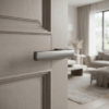 Brisa on Hidden Rosette in graphite, showcasing durable internal door handles on a modern panelled door.