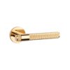 Gloria on Round Rosette – modern brass door handle for internal doors featuring a textured grip and polished gold finish.