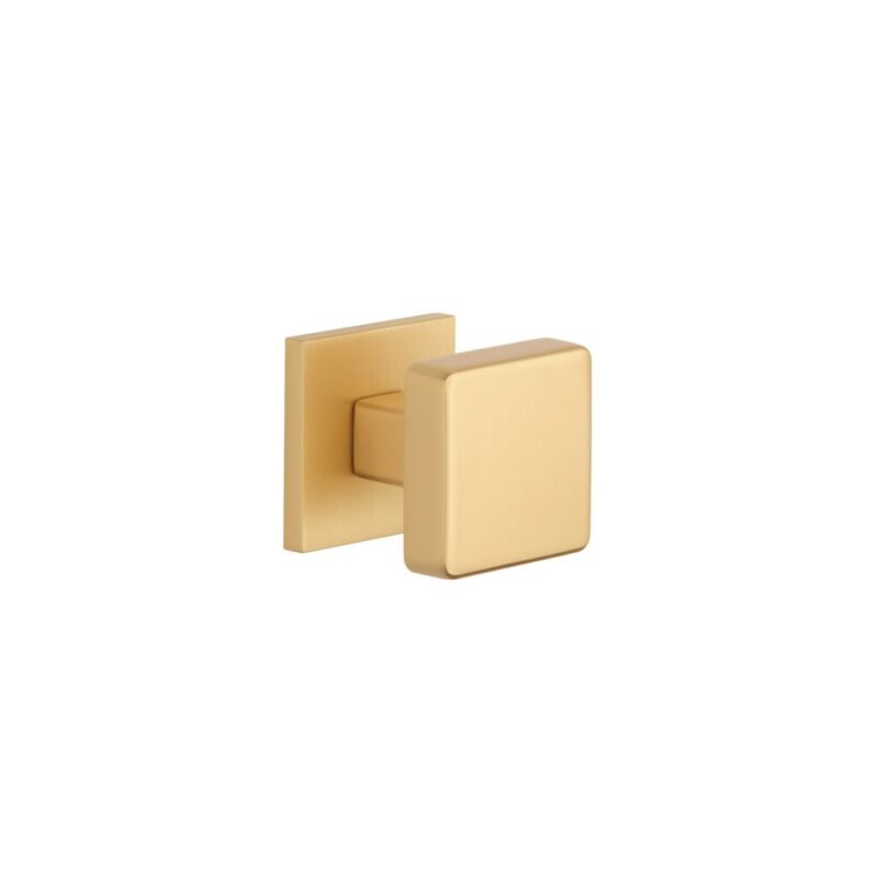 Contemporary square door knob in a soft satin gold finish from the Mora collection, featuring a brushed metallic texture.