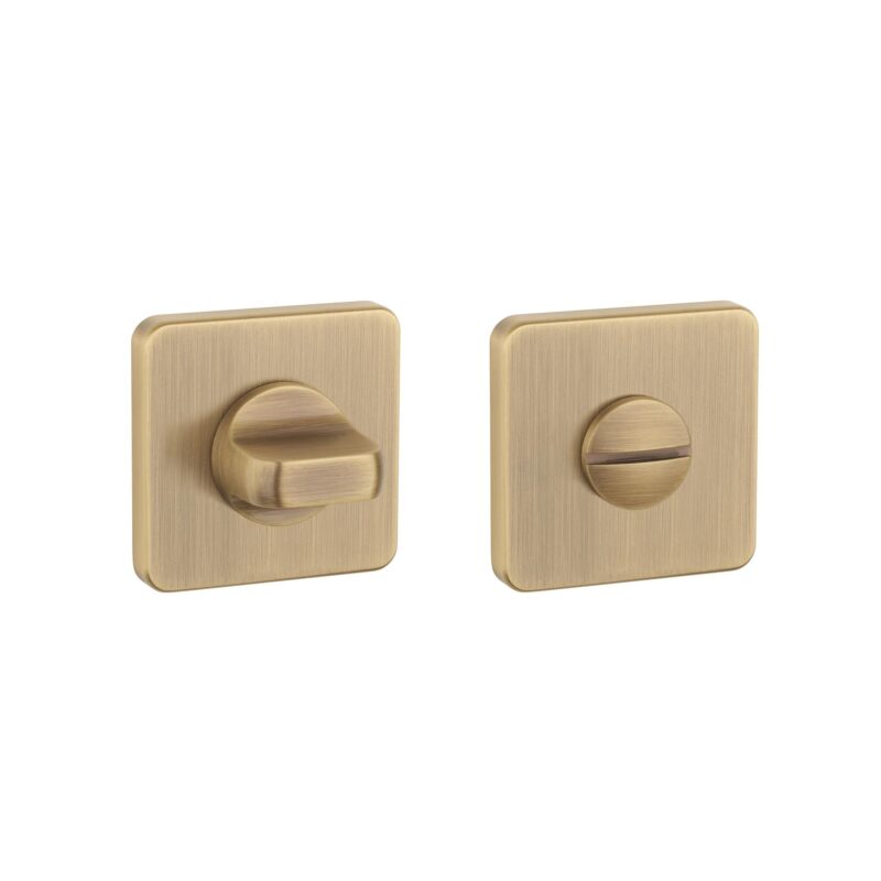 Soft square bathroom thumb turn in antique patina with slim rosette